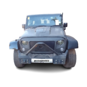 2015 Jeep Wrangler 2.8 JK in the process of being stripped for spares, with parts like the engine, doors, and interior components removed and displayed.