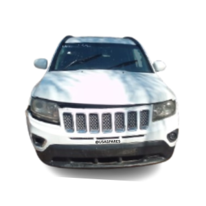 2014 Jeep Compass 2.0 being stripped for spares, showing removed engine parts, body panels, interior components, and mechanical assemblies.