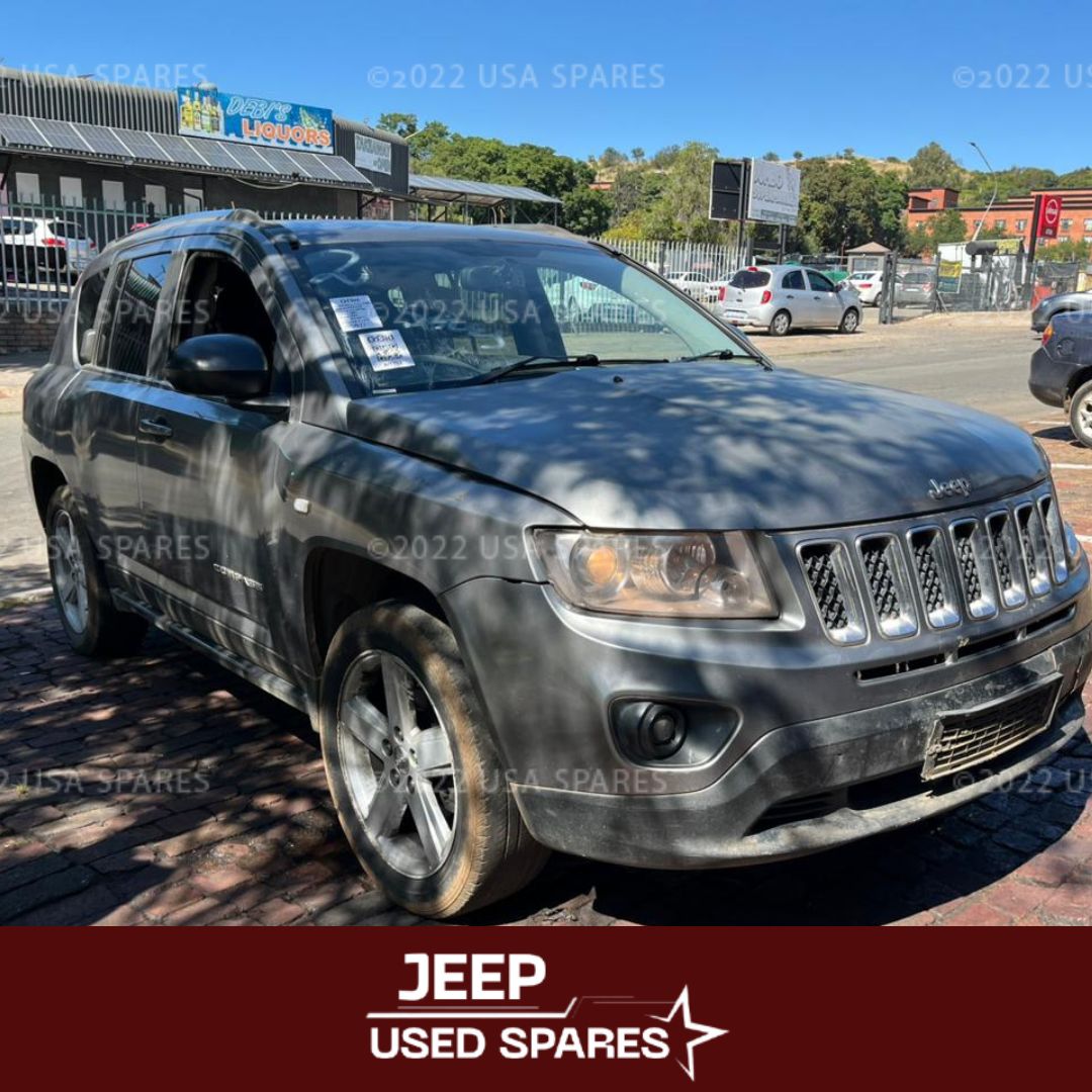 Image of 2012 Jeep Compass 2.0 Manual Petrol stripping for spares, showing a dismantled vehicle with various used parts available including engine components, body panels, and interior items ready for resale.