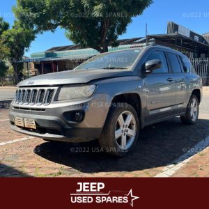 Image of 2012 Jeep Compass 2.0 Manual Petrol stripping for spares, showing dismantled vehicle with available used parts including engine components, gearbox, suspension, body panels, and interior parts ready for resale.